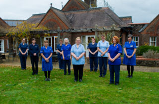 Staff Nurses standing outside inpatient unit