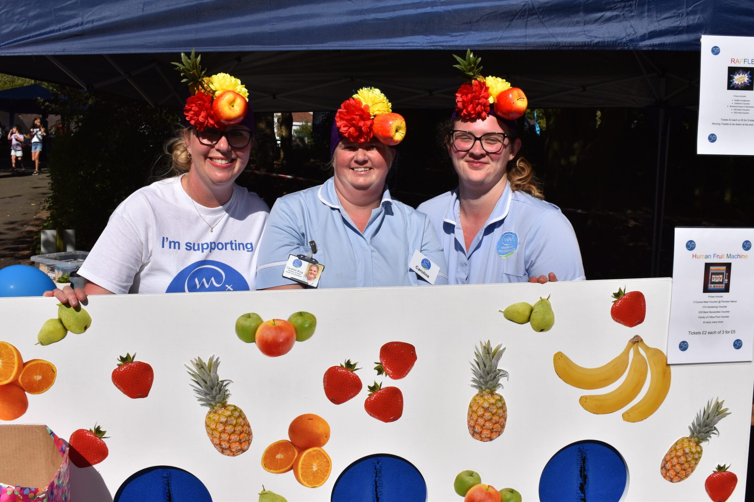 Human Fruit Machine at Summer Fete Weldmar in Dorchester